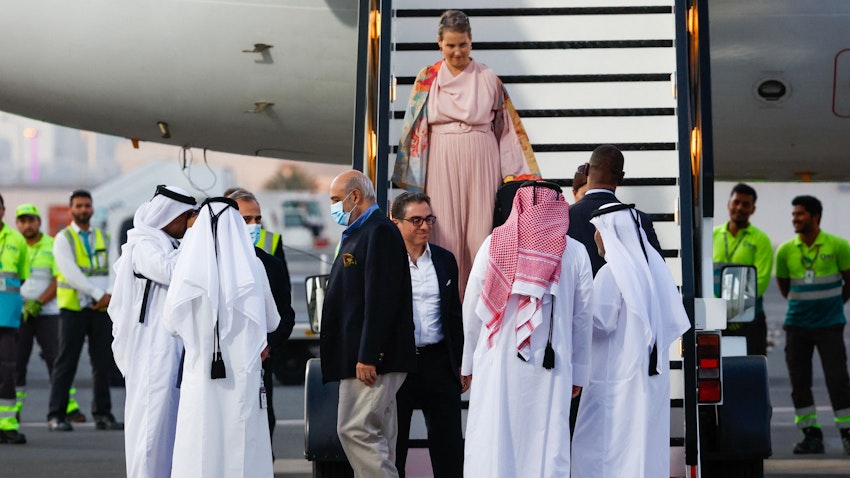 US citizens Siamak Namazi (C with glasses), Emad Sharqi (3rd-L) and Morad Tahbaz (C) are greeted upon their arrival in Doha, Qatar on Sept. 18, 2023. (Photo via Getty Images)