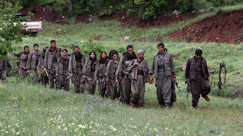 Kurdistan Workers' Party (PKK) fighters arrive in the northern Iraqi city of Dohuk on May 14, 2013. (Photo via Getty Images)
