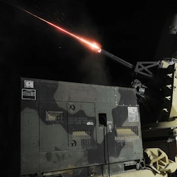 Counter-Rocket, Artillery, Missile (C-RAM) gun fires seen during a test at the Balad airbase in Iraq, on Jan. 31, 2010. (Photo via Brittany Bateman/US Air Force).