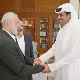 Qatar's Emir Sheikh Tamim bin Hamad Al Thani meets with Hamas Political Bureau Chief Ismail Haniyeh in Doha, Qatar on Oct. 17, 2016. (Handout photo via Qatari Amiri Diwan)