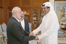 Qatar's Emir Sheikh Tamim bin Hamad Al Thani meets with Hamas Political Bureau Chief Ismail Haniyeh in Doha, Qatar on Oct. 17, 2016. (Handout photo via Qatari Amiri Diwan)