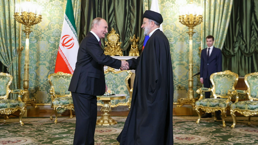 Russian President Vladimir Putin greets Iran’s President Ebrahim Raisi in Moscow, Russia on Dec. 8, 2023. (Photo via Iranian presidency’s website)
