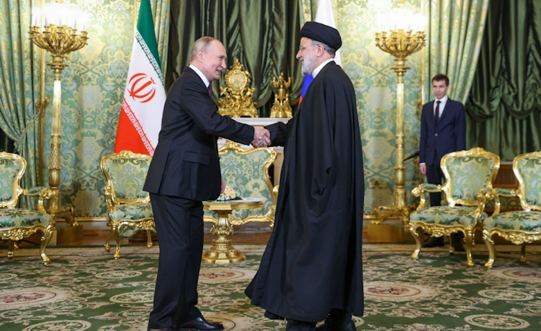 Russian President Vladimir Putin greets Iran’s President Ebrahim Raisi in Moscow, Russia on Dec. 8, 2023. (Photo via Iranian presidency’s website)