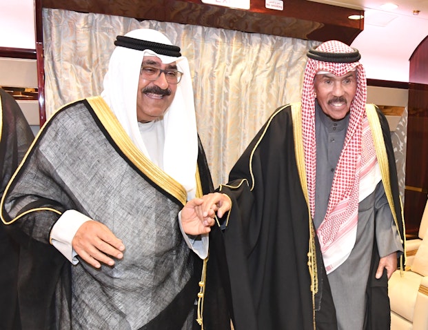 Late Emir of Kuwait Sheikh Nawaf Al-Ahmad Al-Sabah with then Crown Prince Sheikh Meshaal Al-Ahmad Al-Sabah in Kuwait on May 25, 2022. (Handout photo via KUNA)