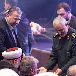 Senior Hamas commander Saleh Al-Arouri and former Iranian Quds Force commander Qasem Soleimani at a commemoration ceremony in Tehran, Iran on Jan. 16, 2018. (Photo via Fars News Agency)