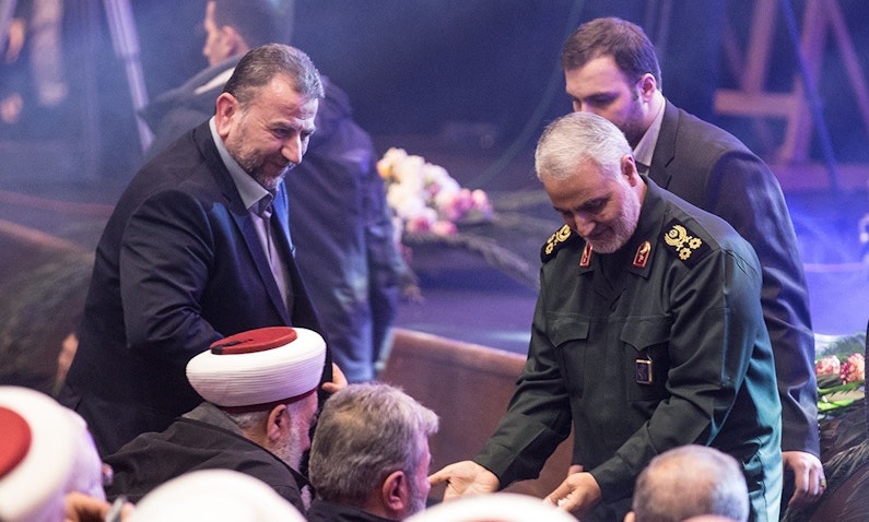 Senior Hamas commander Saleh Al-Arouri and former Iranian Quds Force commander Qasem Soleimani at a commemoration ceremony in Tehran, Iran on Jan. 16, 2018. (Photo via Fars News Agency)