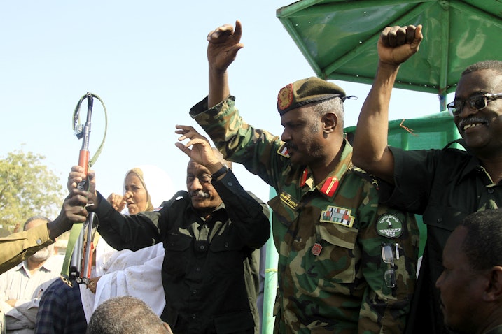 Sudanese army officials headed by Gen. Abdel Fattah Al-Burhan greet a crowd in Gedaref, Sudan, on Jan. 16, 2024. (Photo via Getty Images)