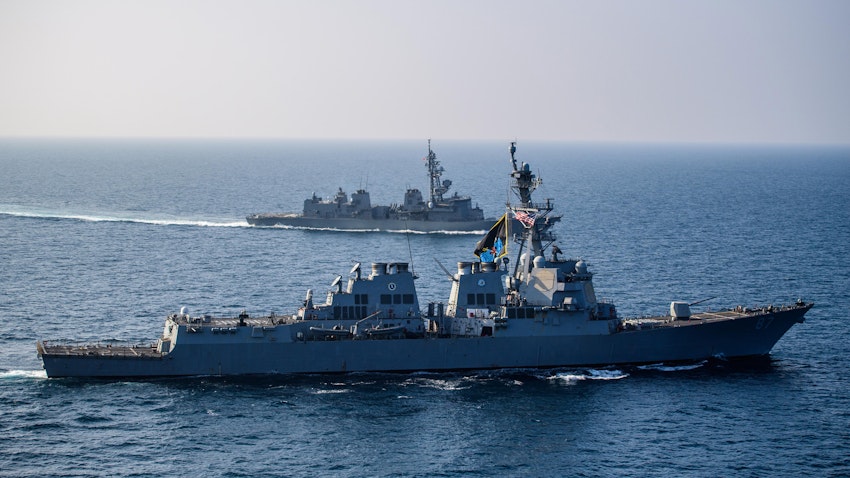 The USS Mason sails alongside the Japanese destroyer Akebono in the Gulf of Aden, Yemen on Nov. 25, 2023. (Photo by Samantha Alaman via US Department of Defense)
