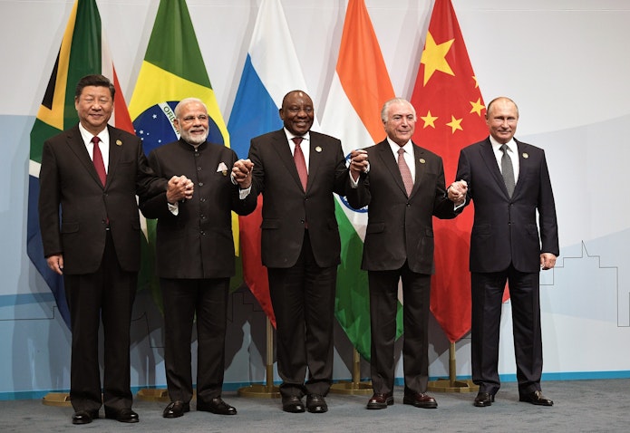 Leaders of BRICS member states pose for a group photo at the annual summit in Johannesburg, South Africa on July 26, 2018. (Photo via Wikimedia Commons)