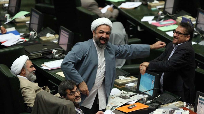 Iranian MPs Hamid Rasaee and Mohammad Reza Tabesh seen in parliament in Tehran, Iran on June 10, 2014. (Photo by Marzieh Soleimani via IRNA)