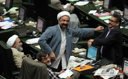Iranian MPs Hamid Rasaee and Mohammad Reza Tabesh seen in parliament in Tehran, Iran on June 10, 2014. (Photo by Marzieh Soleimani via IRNA)