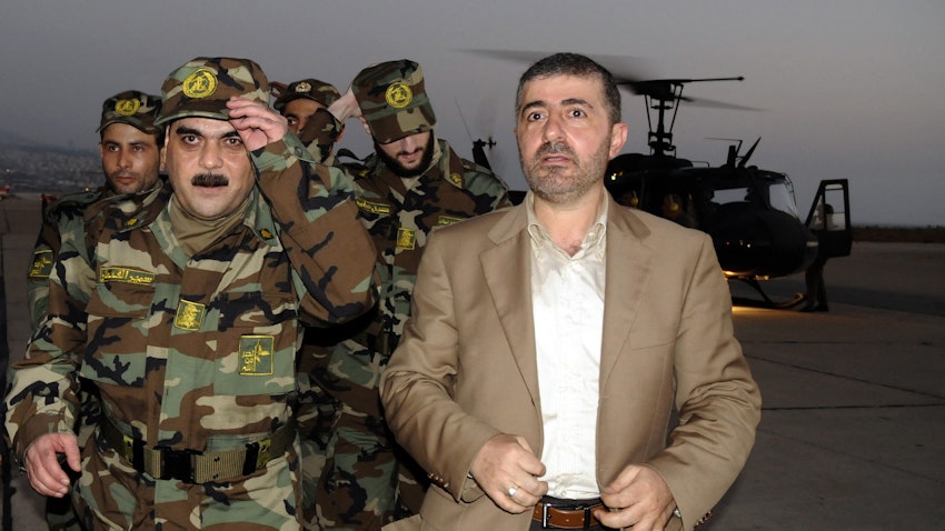 Hezbollah Liaison and Coordination Unit chief Wafiq Safa seen with freed Lebanese prisoners at Beirut airport, Lebanon on July 16, 2008. (Photo via Getty Images)