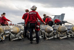 American crews arm aircraft aboard the USS Harry Truman on Apr. 7, 2025. (Source: CENTCOM/Twitter/X)