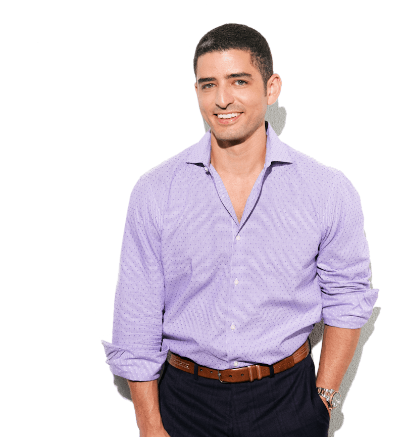 Dr. courtney standing in a purple shirt smiling