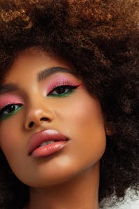beauiful woman with smooth skin and colorful eyeshadow