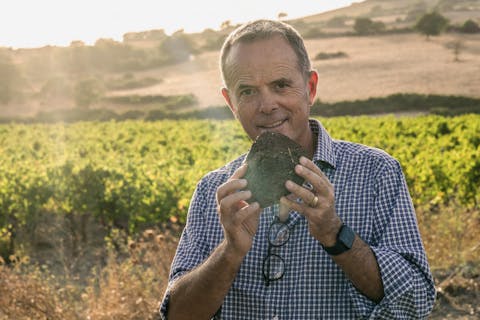 Stefano Casadei shows the soil of Olianas Stefano Casadei at Olianas