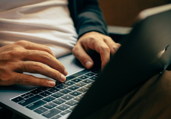 Typing on a laptop 2
