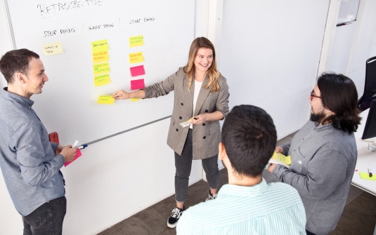 software development team at a brainstorming session software development team at a brainstorming session