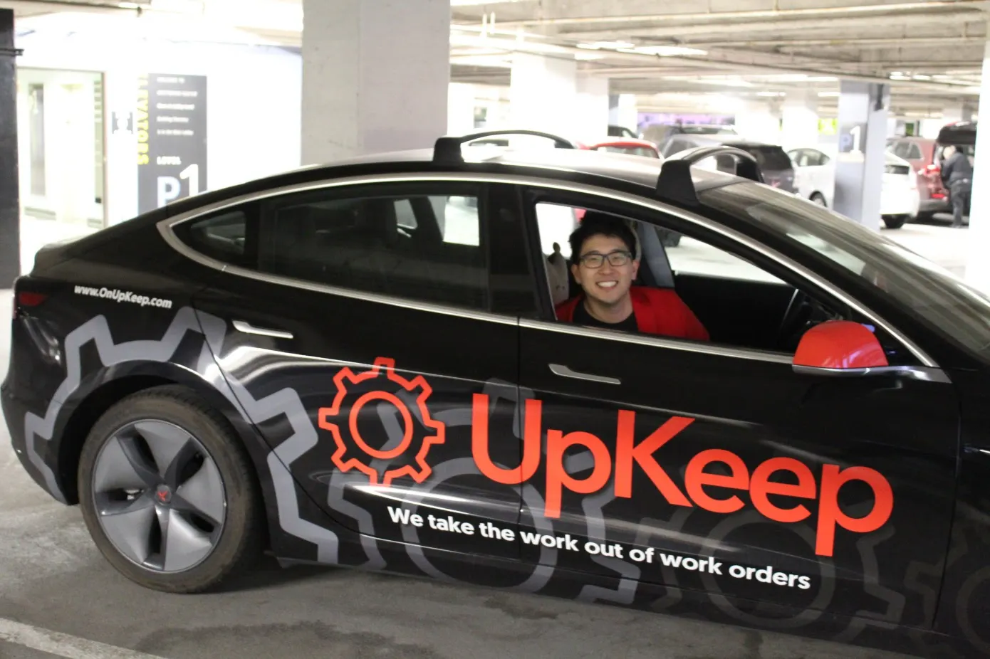 photo showing upkeep sticker on ceo ryan chan's car