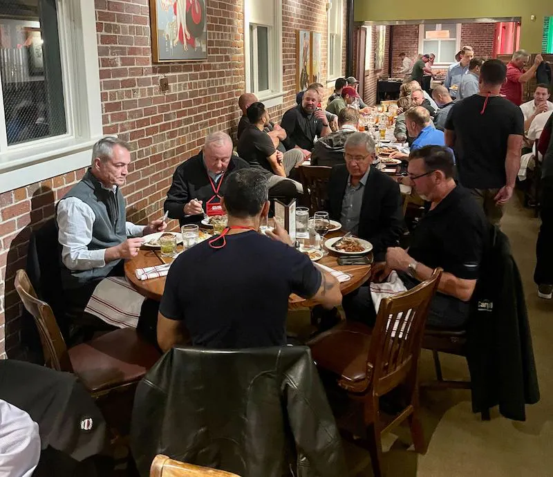 people eating at upkeep's smrp bbq event