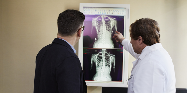 Image of doctor explaining an x-ray
