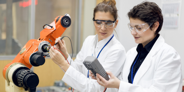 worker performing mobile equipment inspection