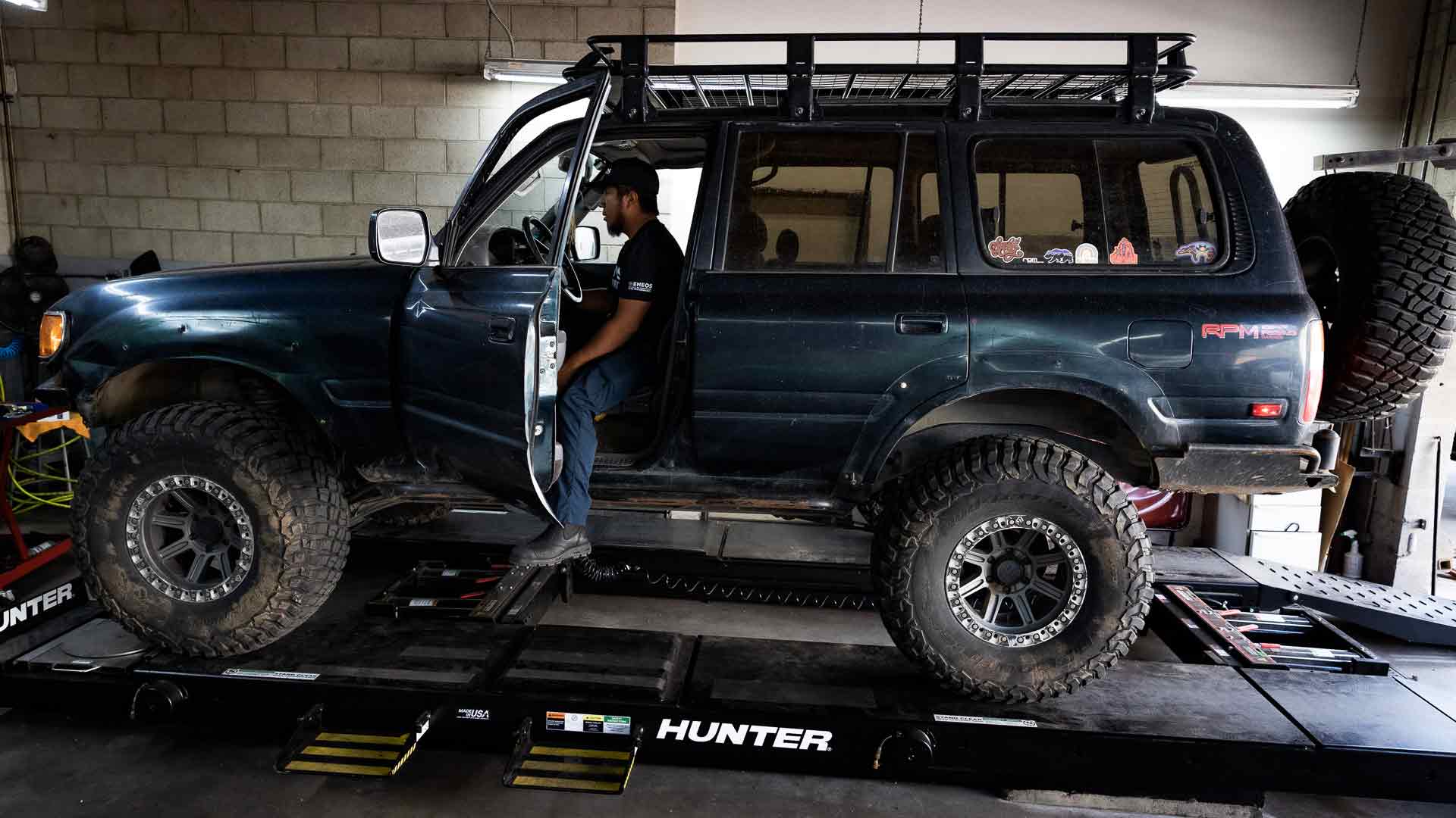 offroad vehicle in a customs auto shop