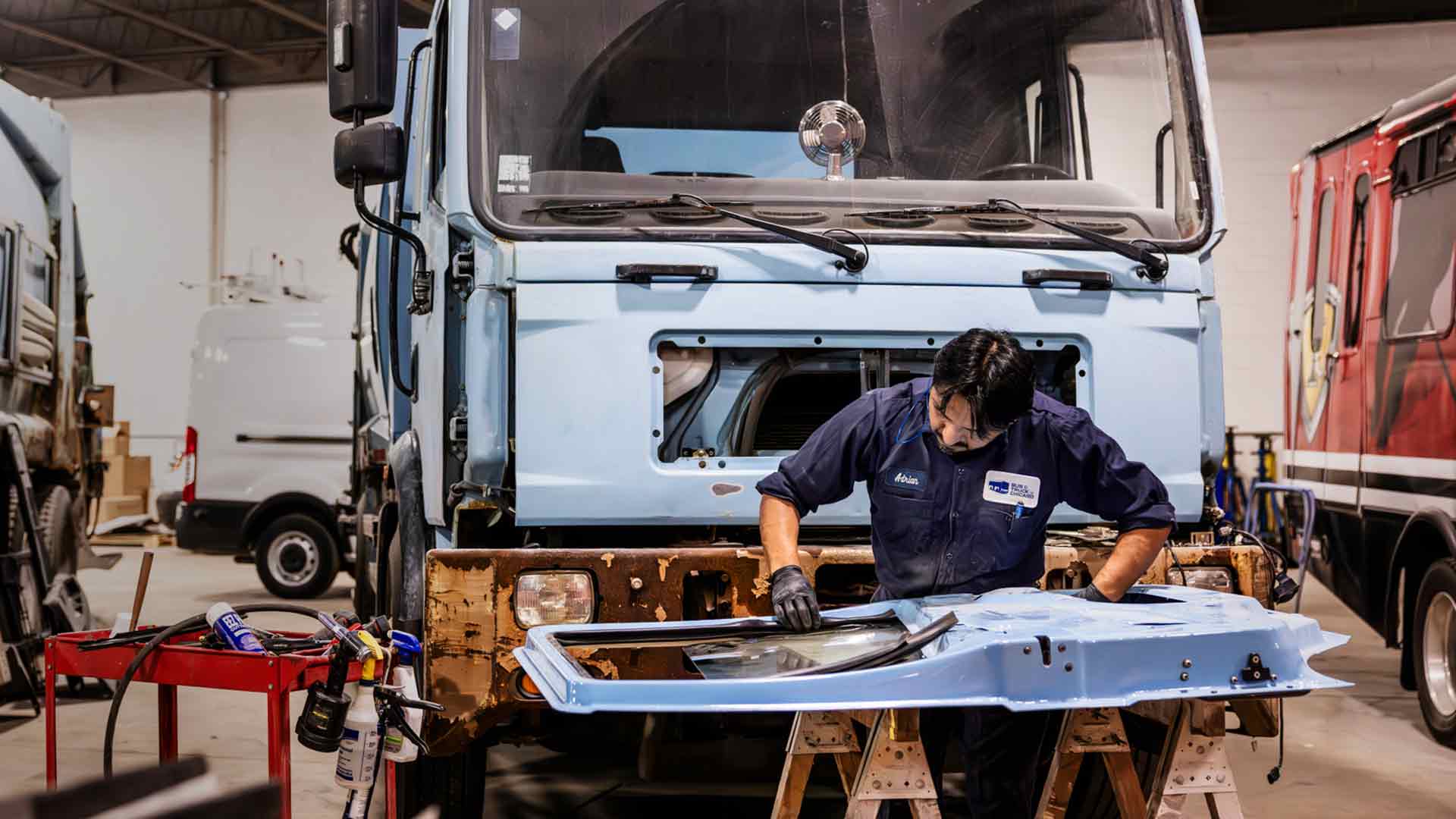 heavy duty truck technician working on a fleet vehicle