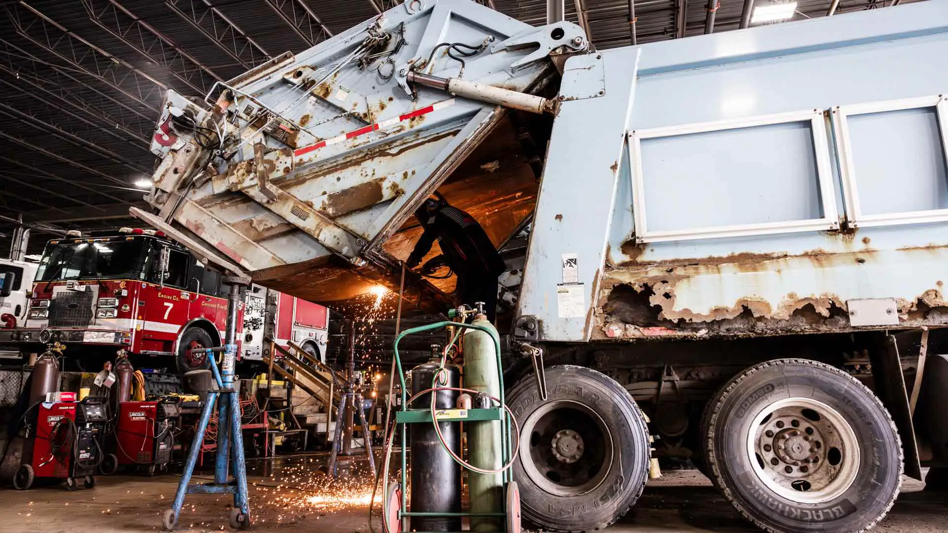 tech welding a heavy duty truck