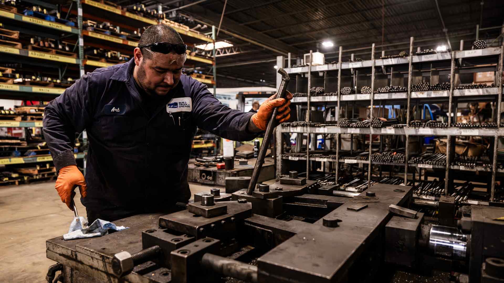 Heavy Duty Technician looking at tools