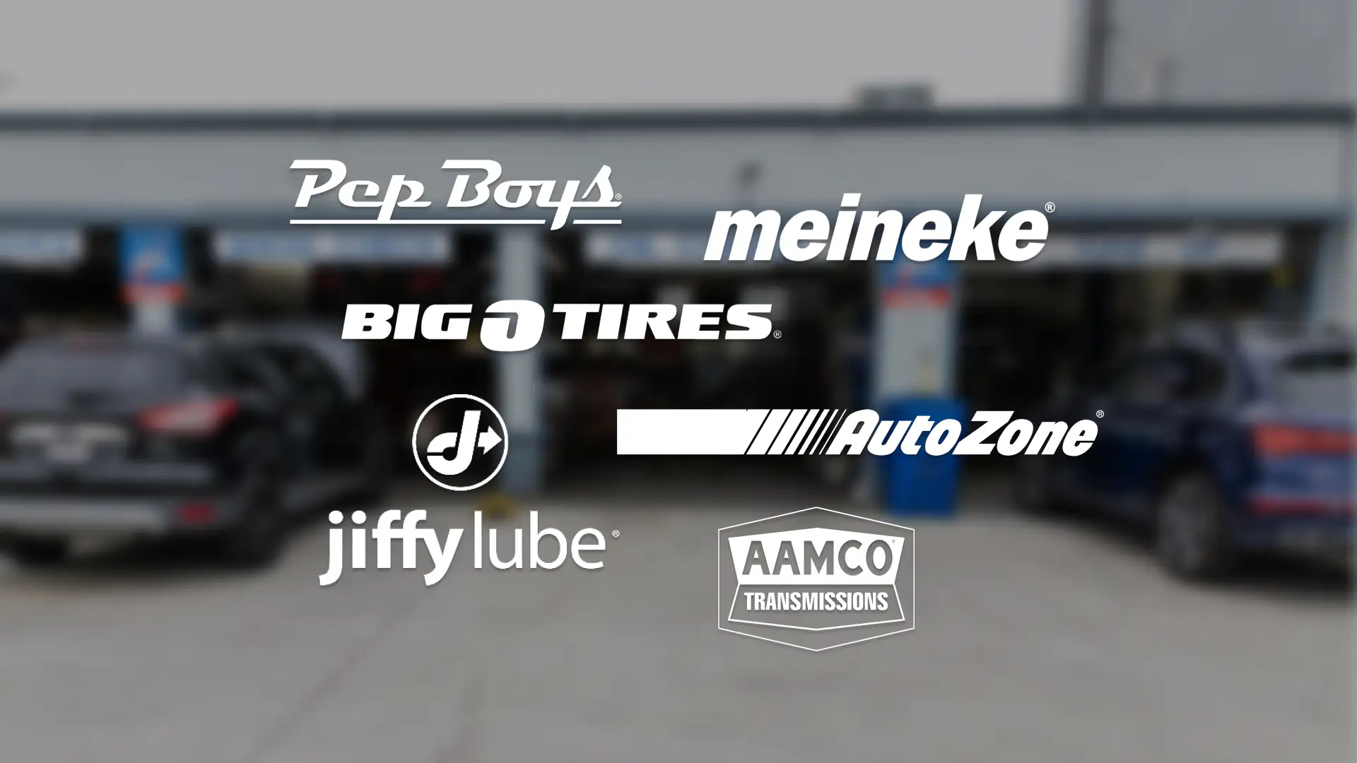 An auto repair lot behind the logos of major auto repair brands including Pep Boys, Meineke, Big O Tires, Jiffy Lube, Auto Zone, and AAMCO.