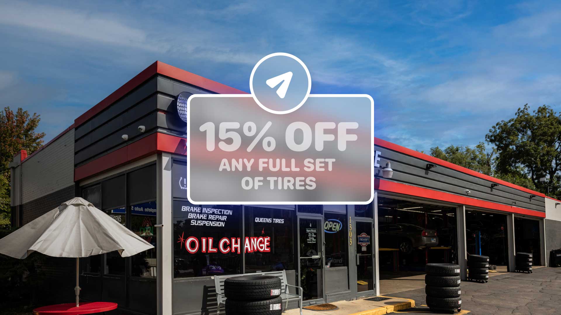A tire shop offering a 15% discount on a full set of tires.