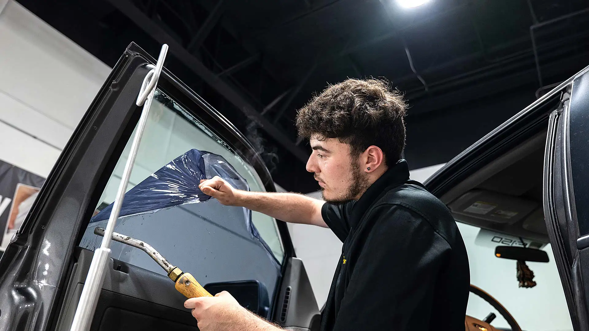 Tint World Tech removing window tint