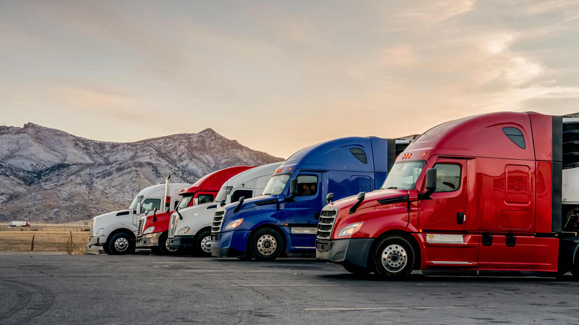 5 road-ready semi-trucks.