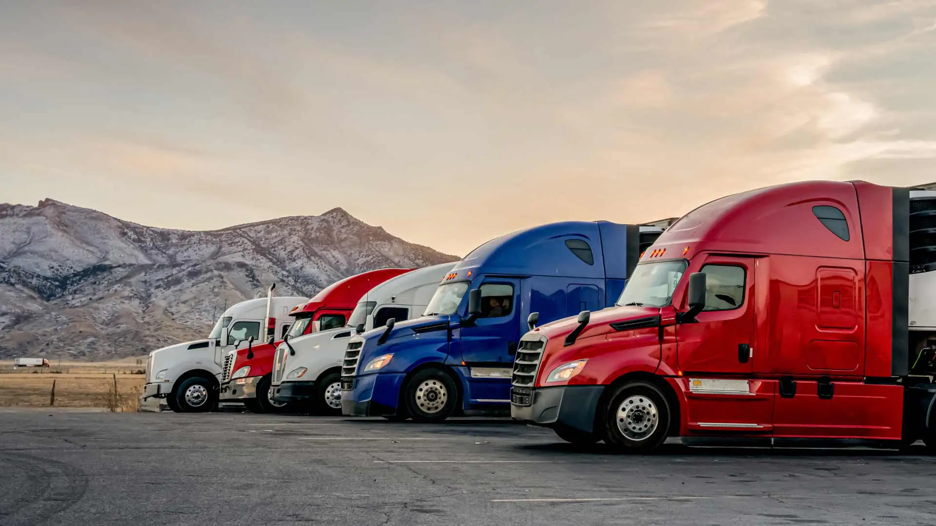 5 road-ready semi-trucks.