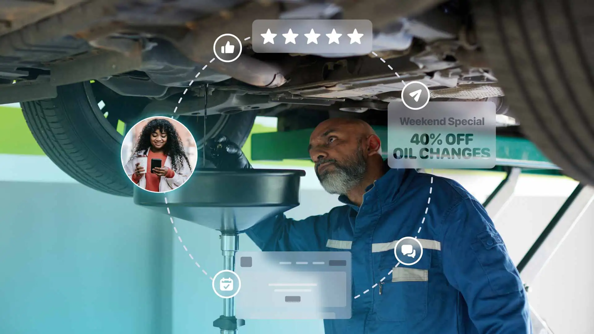 An auto shop owner working on a vehicle.