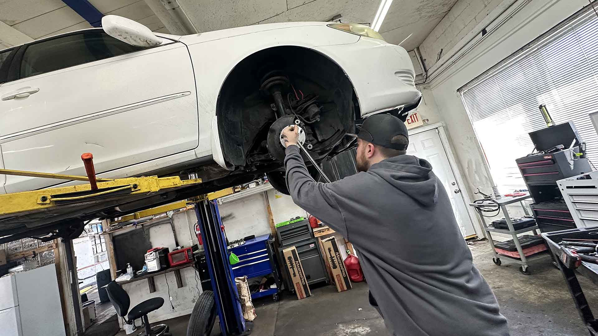 Mechanic working on a car