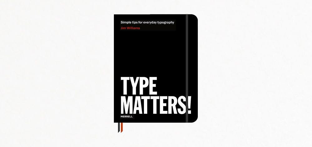 Black notebook cover with white text saying 'Type Matters'
