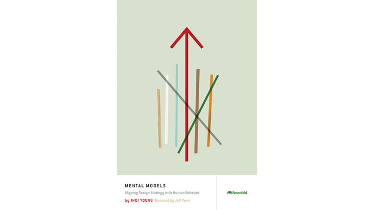 Sage green book cover with multicolored lines and a red arrow 