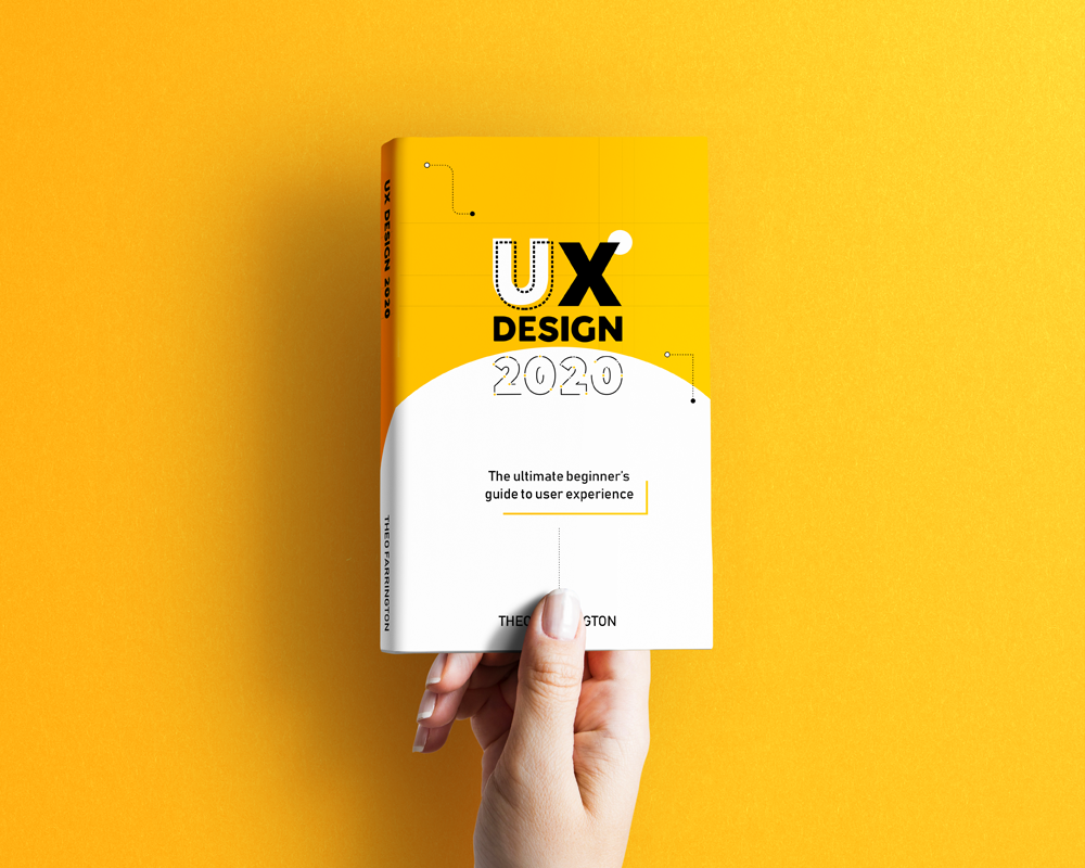 yellow background with book being held in centre of image, yellow and white cover on book with block text saying UX design 2020