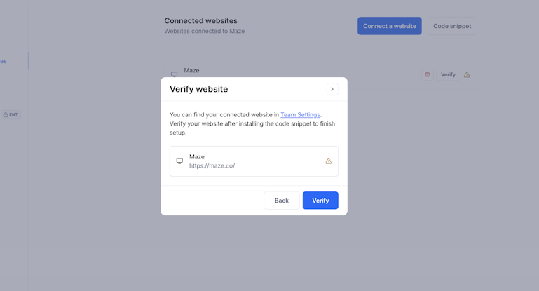Verify website dialog in Maze showing how to confirm a connected website after installing the code snippet.