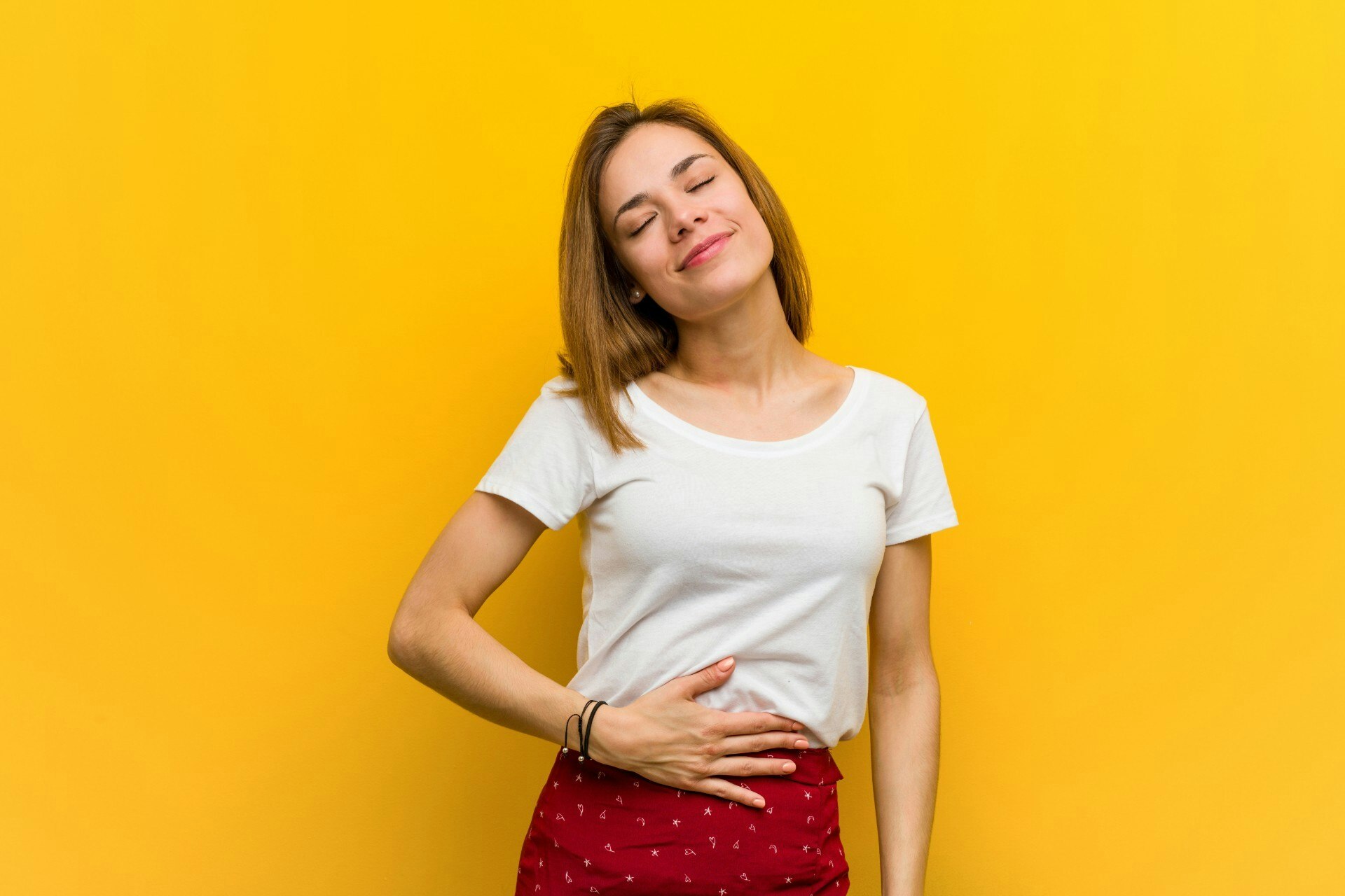 Woman holding her head Smiling
