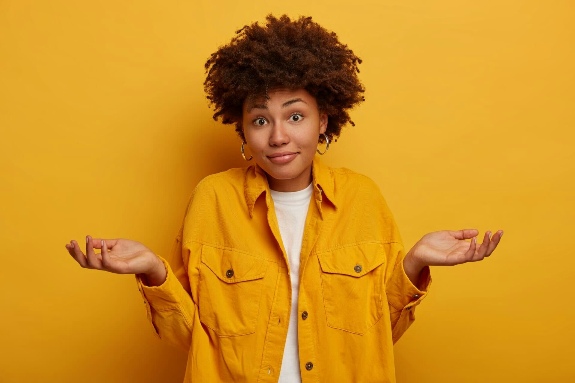 Woman holding her head Smiling