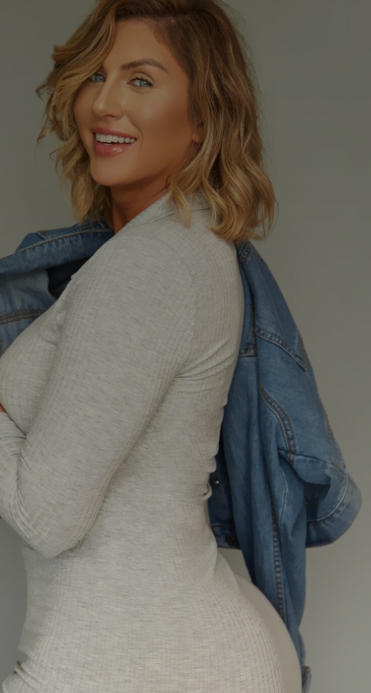 Woman holding her head Smiling
