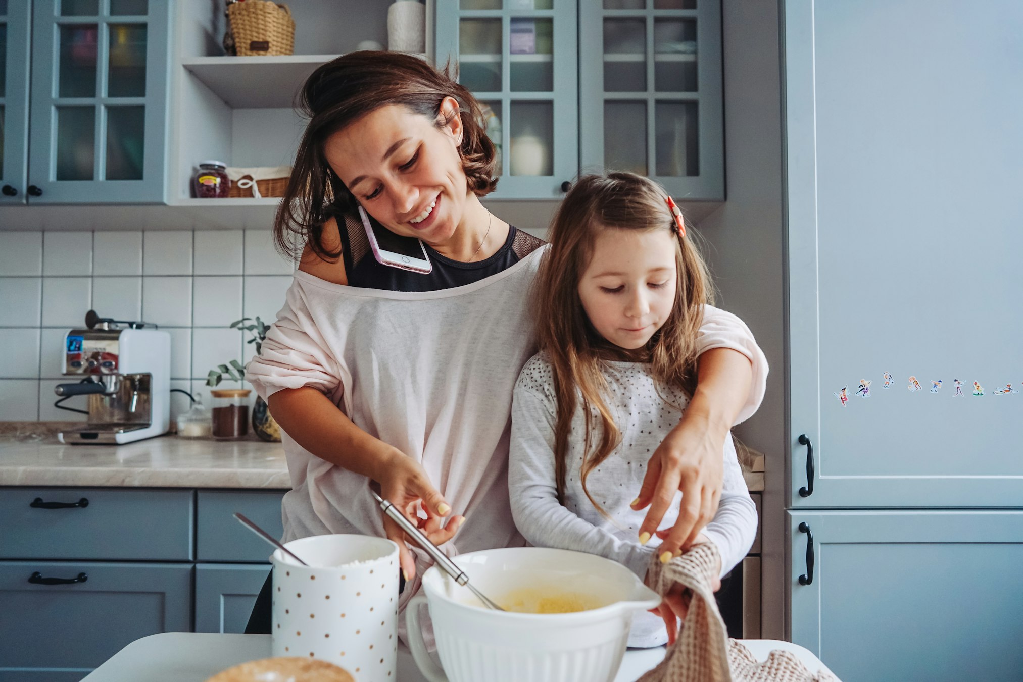 Mother cooking with child