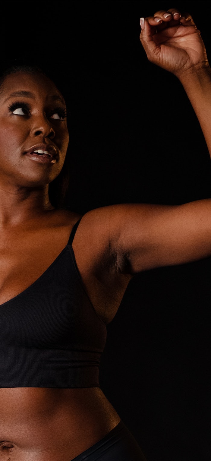 Woman holding up arm