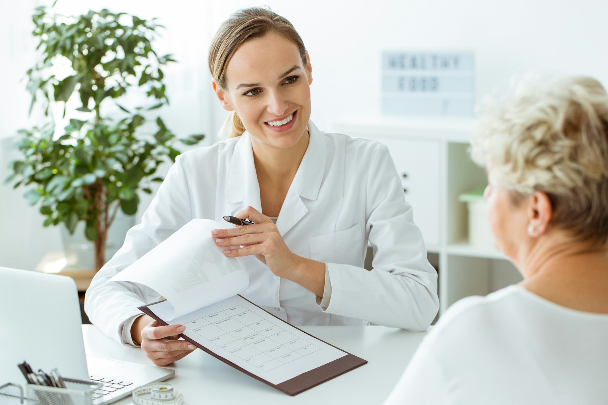 Smiling doctor during medical examinations