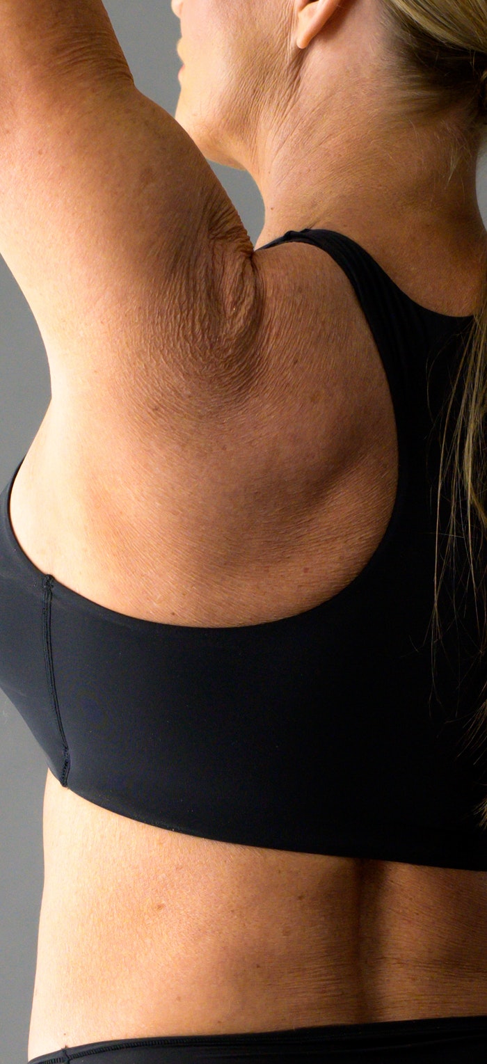 womans back in sports bra
