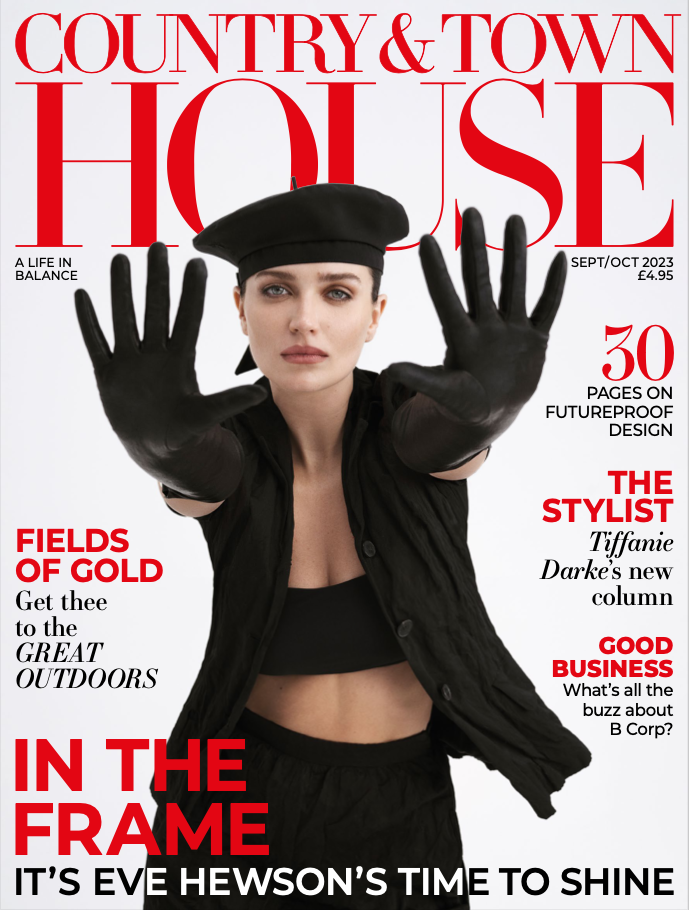cover photo of country and town magazine featuring woman with black clothes and gloves