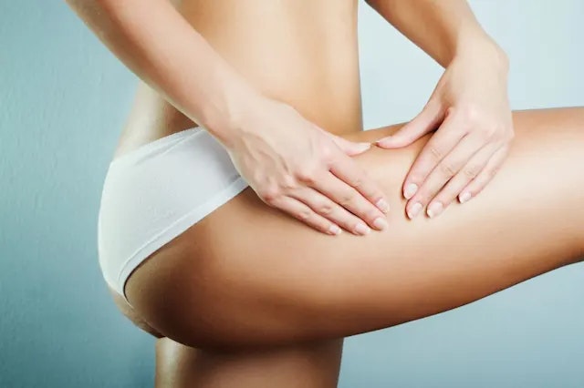 stock photo of woman in underwear showing off thigh